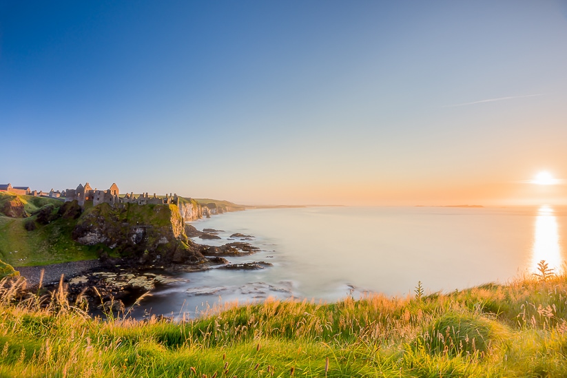 Dunluce Castle at sunset in Northern Ireland